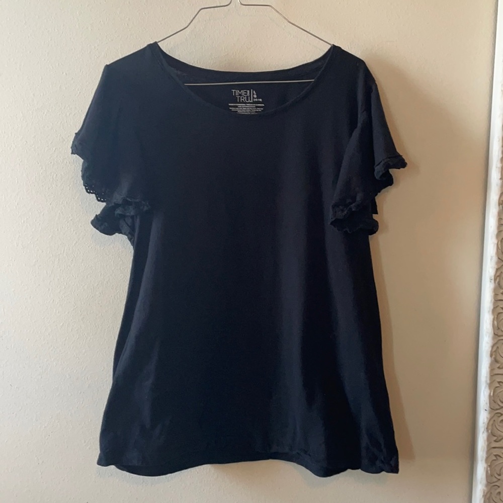 Size large black tee with ruffle detail on sleeve